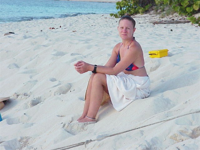 Patty relaxes on sand spit.jpg (66005 bytes)